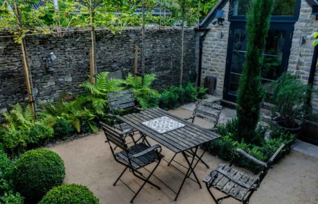 Italian stlye garden design with ferns and topiary